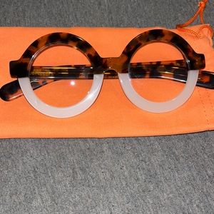 Brown and White Glasses